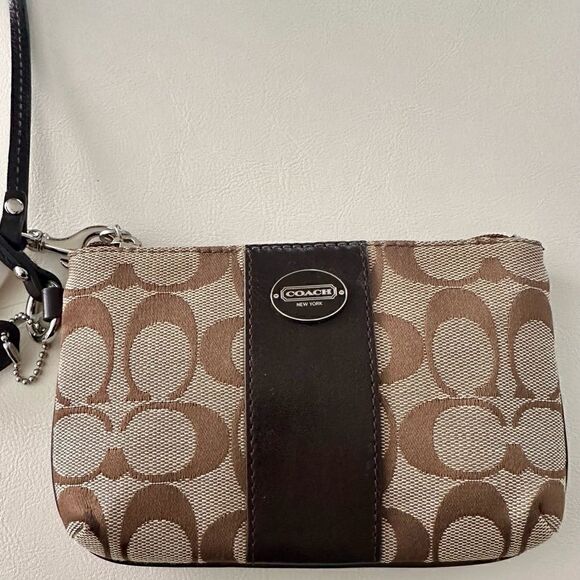 Coach Signature canvas wristlet with leather trim. - Picture 3 of 6